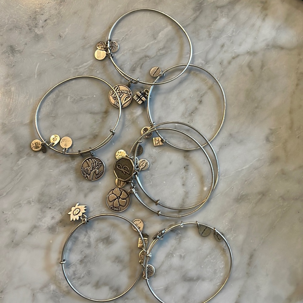 Alex and Ani (+) Energy 7 piece set. (Initial J charm) Great stacking bracelets.